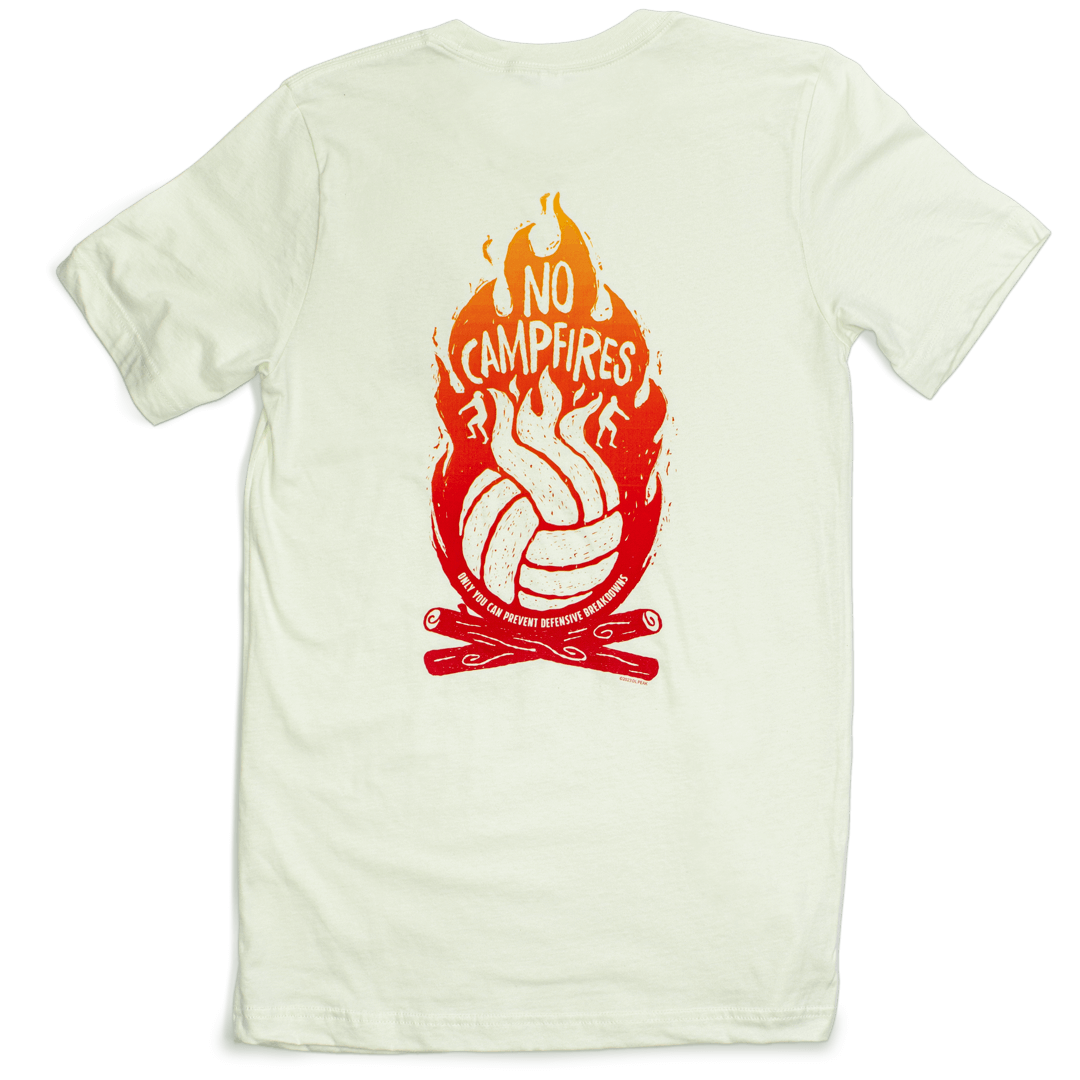 No campfires graphic volleyball t-shirt. Back design features volleyball panels as flames in shirt color in the middle of campfire. Type reads, "only you can prevent defensive breakdowns." T-shirt is citron - a very light green. Graphic is gradient of dar