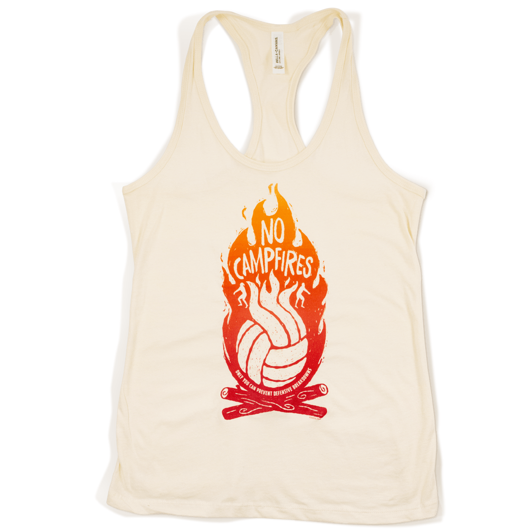 No campfires graphic women's volleyball tank. Front design features volleyball panels as flames in shirt color in the middle of campfire. Type reads, "only you can prevent defensive breakdowns." Tank top is natural color. Graphic is gradient of dark red t