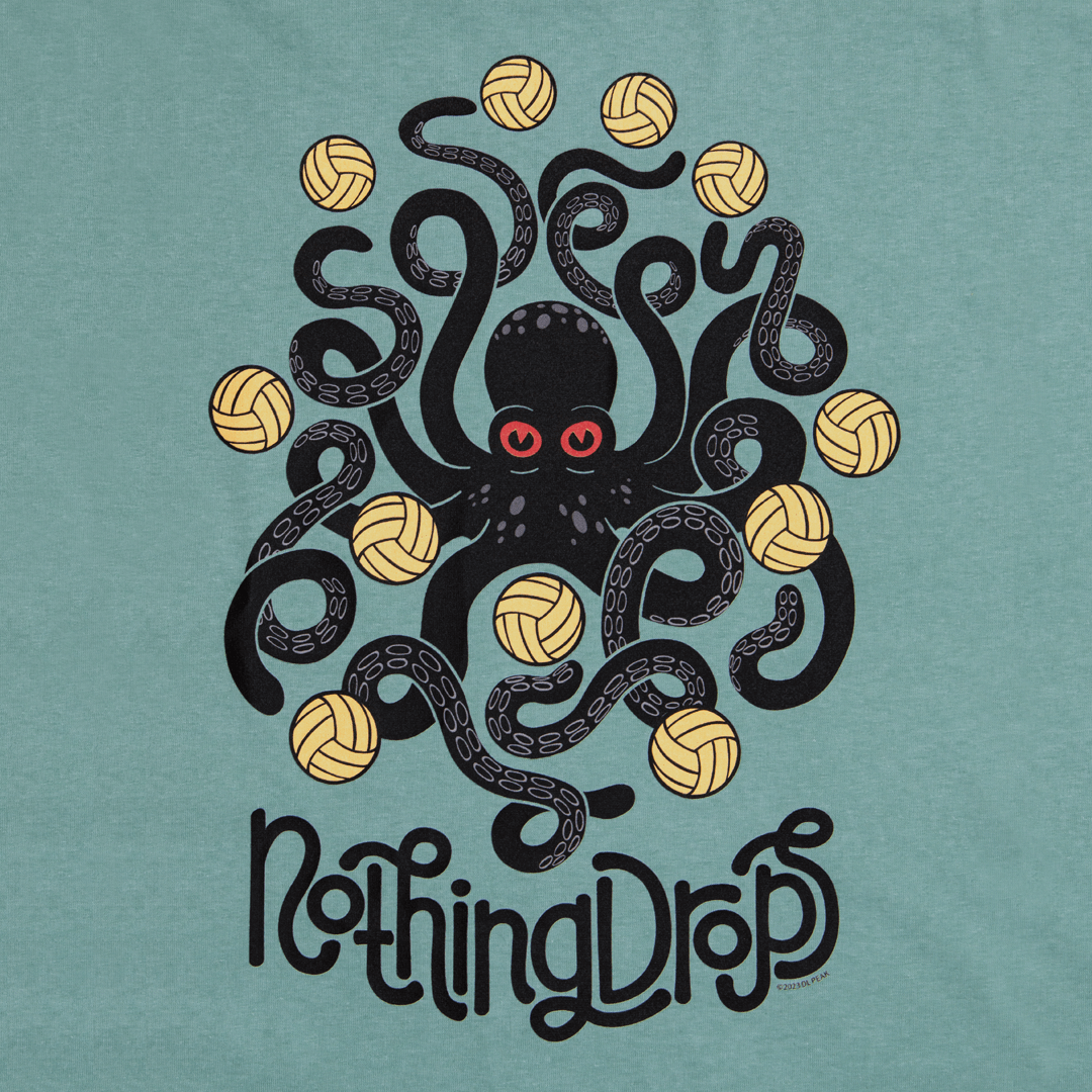 Nothing drops volleyball men's t-shirt detail art. Dusty blue color shirt. Graphic is an octopus keeping multiple volleyball in the air. Octopus is dark gray; almost black. Eyes are red. Volleyballs are yellow. Shirt is dusty blue; a muted dark green-blue