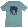 Spikeodelic volleyball men's t-shirt in dusty blue. Back graphic is man's face with afro made from volleyballs and players spiking volleyballs. Man's glasses are round and feature volleyballs. The words "Spikeodelic" are below the graphic. The majority of