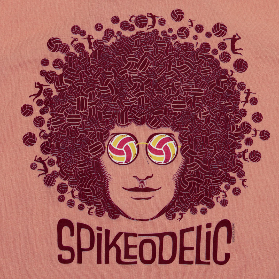Spikeodelic volleyball women's tank top detail of art. Front graphic is man's face with afro made from volleyballs and players spiking volleyballs. Man's glasses are round and feature volleyballs. The words "Spikeodelic" are below the graphic. The majorit