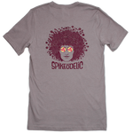 Spikeodelic volleyball men's t-shirt in pebble. Back graphic is man's face with afro made from volleyballs and players spiking volleyballs. Man's glasses are round and feature volleyballs. The words "Spikeodelic" are below the graphic. The majority of the